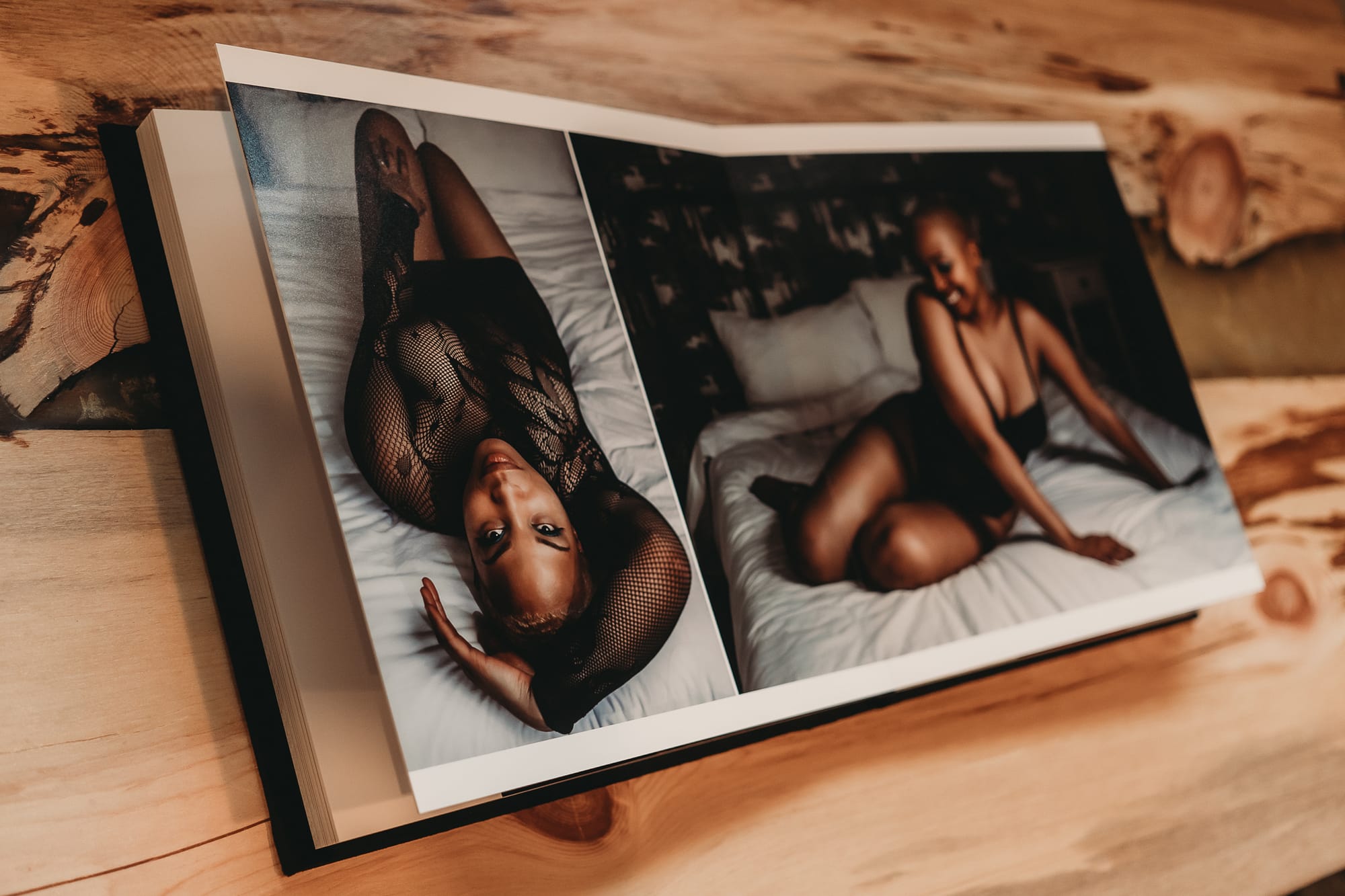 Thick page album with black velvet cover showing a spread with a short haired woman wearing a black bodysuit and posing on the bed. Photo by Embodied Art Boudoir. Body positive, body positive photography, fat positive, fat positive art, fat positive photography, colorado boudoir, denver boudoir, boulder boudoir, body positive colorado, haes, plus size photography, plus size art, women, beautiful, body positive art, big body art, you are beautiful, inclusive photography, inclusive art, celebrate all bodies, diverse photography, body positivity photoshoot