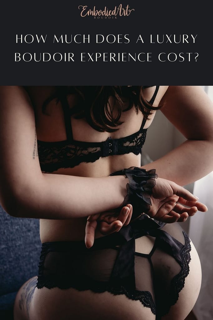 Blog Post: How Much Does a Luxury Boudoir Photoshoot Cost? A woman's hands cuffed behind her back. She's wearing lacy black lingerie and her hair is brushing her back. Photo by Embodied Art Boudoir, Colorado boudoir photography, boudoir photo session, boudoir photoshoot, luxury boudoir, luxury photography, confident women, art photography, body as art, boudoir poses, natural hairstyles, empowering photography, professional hair and makeup, self love photoshoot, body positive, self care, luxury photoshoot, confidence, boudoir pricing, photoshoot pricing