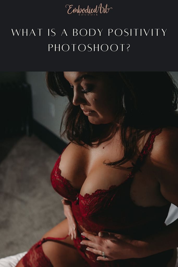 Woman wearing a full set of red lace lingerie, eyes closed, kneeling on the bed, caressing and loving her belly. Photo by Embodied Art Boudoir. Body positive, body positive photography, fat positive, fat positive art, fat positive photography, colorado boudoir, denver boudoir, boulder boudoir, body positive colorado, haes, plus size photography, plus size art, women, beautiful, body positive art, big body art, you are beautiful, inclusive photography, inclusive art, celebrate all bodies, diverse photography, body positivity photoshoot