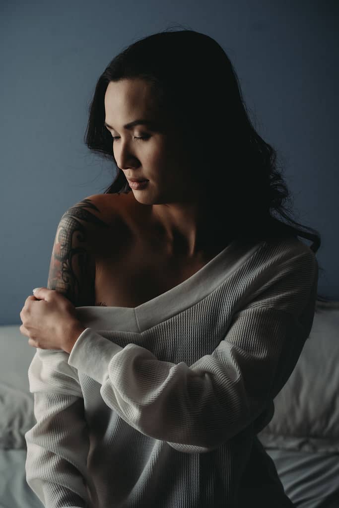 Woman wearing a white off the shoulder sweater. Photo by Embodied Art Boudoir. Growth, confidence, self-confidence, boundaries, boundary, boundary setting, saying no, self-worth, female empowerment, self-love, self-care practice, healthy relationships, emotional boundaries, physical boundaries, boundaries with family, boundaries at the holidays, boudoir, boudoir photo shoot, boudoir inspiration, colorado boudoir, denver boudoir, boulder boudoir, colorado springs boudoir