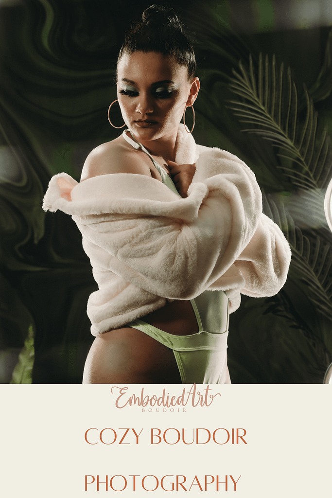 Woman standing wearing a green body suit and a white fleece jacket. Photo by Embodied Art Boudoir, cozy, cozy boudoir, cozy vibes, cozy outfits, cozy and comfortable, cozy boudoir photography, cozy inspiration, keep it cozy, boudoir outfit, boudoir outfit inspiration, what to wear to boudoir, colorado boudoir, denver boudoir, boulder boudoir, colorado springs boudoir, boudoir ideas, boudoir poses, boudoir inspiration, photography inspiration