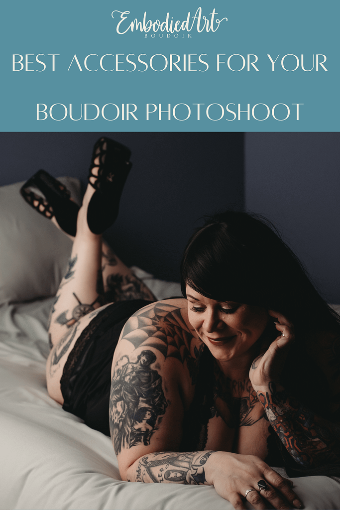 Woman with long black hair and tattoos lying on bed wearing black panties and black high heels. hoto by Embodied Art Boudoir. Accessories, boudoir outfits, boudoir style, boudoir looks, accessorise, sheets, jewellery, scarf, sheet, creative outfits, sexy look, confidence, boudoir photoshoot, classy photography, sensual photography, sensual boudoir, colorado boudoir, denver boudoir, boulder boudoir, colorado springs boudoir, boudoir ideas 
