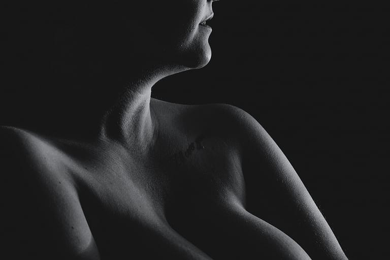 Bodyscapes photo of a woman's body. Photo by Gabby Jockers Photography. Nudescapes, nude, black and white, high contrast, low key light, boudoir, boudoir photography, sensual photos, Colorado boudoir, Denver Boudoir, Golden Boudoir, boudoir studio, elegant photography, abstract